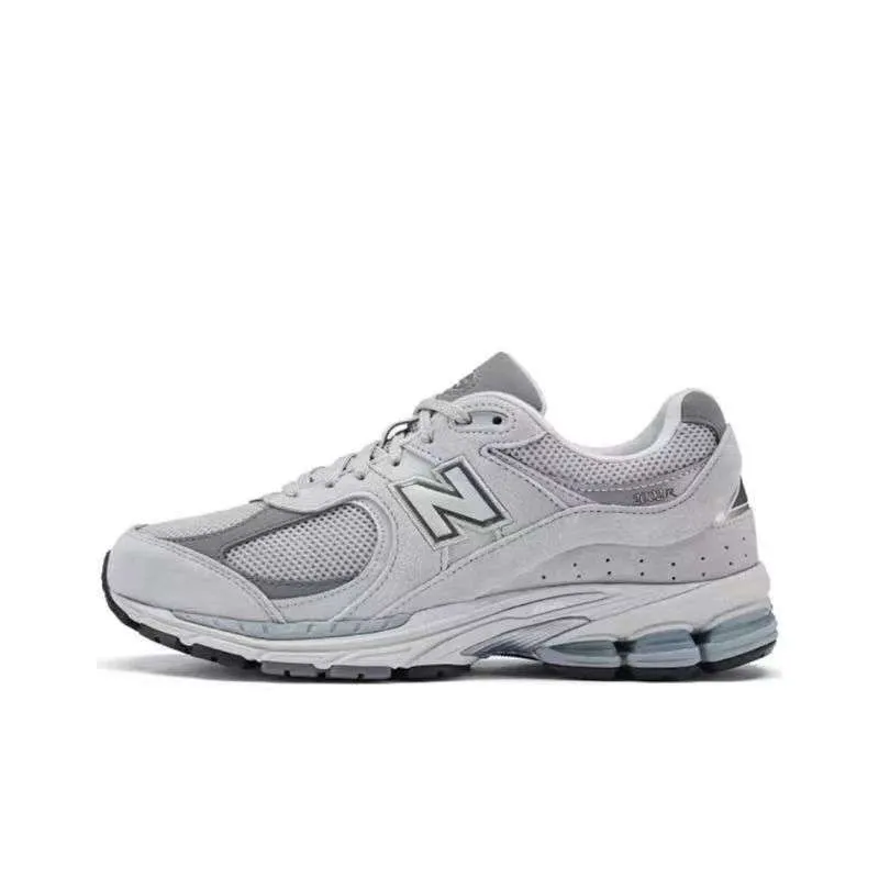 IMG-20250414-WA0034.webp New balance 2002r Grises y blancas