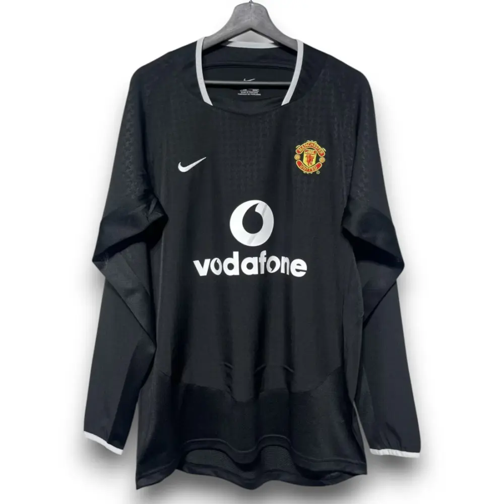 manu03-04blackawaylongsleeve.webp Camiseta Manchester United 2003-2004 Visitante Manga Larga