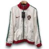 portugal-white-with-green-windbreaker-jacket-Photoroom.jpg Chaqueta Portugal 2025-2026 – Cortavientos