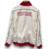 portugal-white-with-green-windbreaker-jacket1-Photoroom.jpg Chaqueta Portugal 2025-2026 – Cortavientos