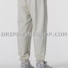 1b0079fe NK PANTS - Gris