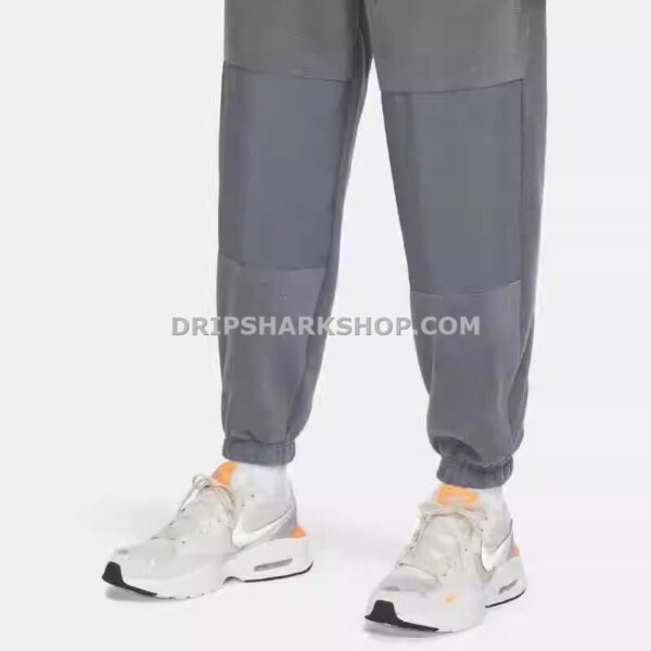 NK PANTS - Gris