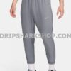 NK PANTS - Gris