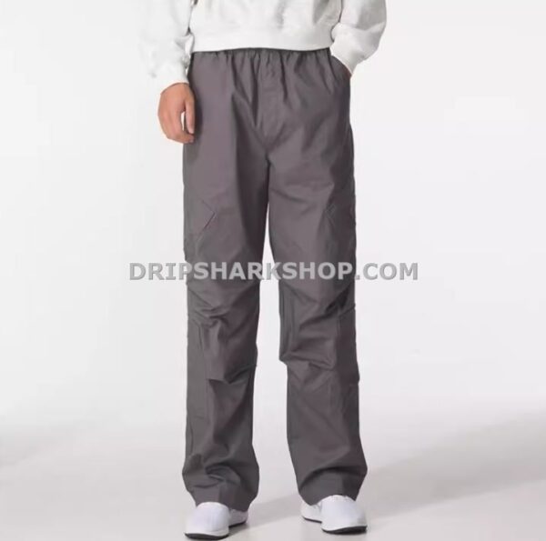 6b6565a3 NK PANTS - Gris