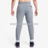 NK PANTS - Gris