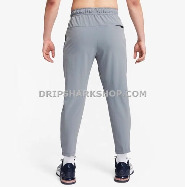 NK PANTS - Gris