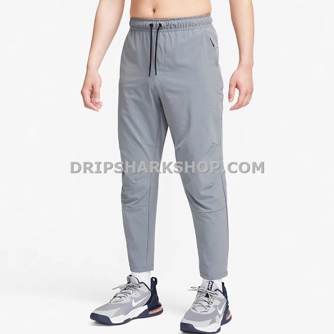 NK PANTS - Gris