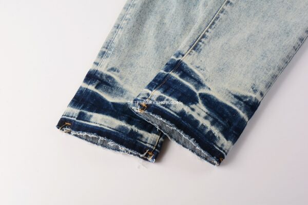 423613e0 Vaqueros Purple Brand